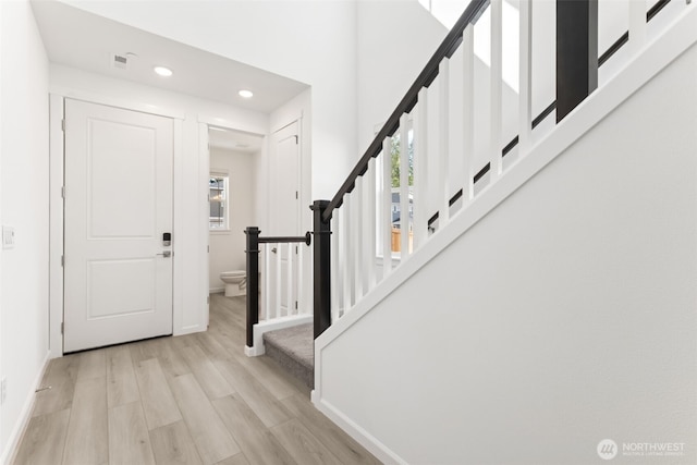 20519 97th Ave E Unit 26, Graham, WA 98338 - foyer entrance featuring stairway, recessed lighting, wood finished floors, and baseboards