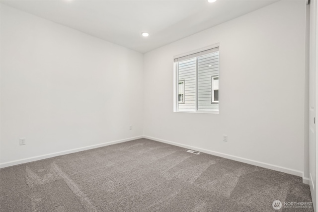 20519 97th Ave E Unit 26, Graham, WA 98338 - carpeted spare room featuring baseboards and recessed lighting