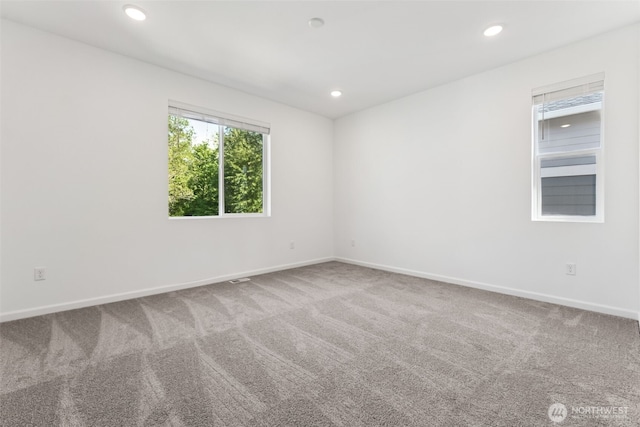 20519 97th Ave E Unit 26, Graham, WA 98338 - carpeted spare room featuring baseboards and recessed lighting