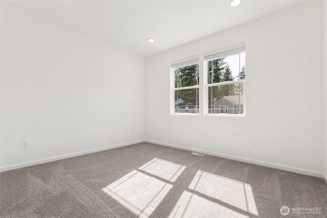 20519 97th Ave E Unit 26, Graham, WA 98338 - carpeted spare room featuring baseboards and recessed lighting
