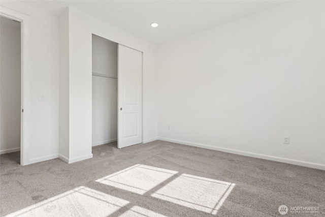 20519 97th Ave E Unit 26, Graham, WA 98338 - unfurnished bedroom with carpet, baseboards, a closet, and recessed lighting