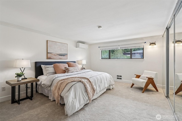 300 N 137th St Unit C, Seattle, WA 98133 - carpeted bedroom featuring a wall mounted air conditioner and crown molding