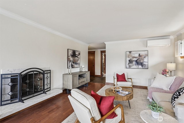 300 N 137th St Unit C, Seattle, WA 98133 - living area with a wall mounted AC, crown molding, wood finished floors, and a fireplace with raised hearth