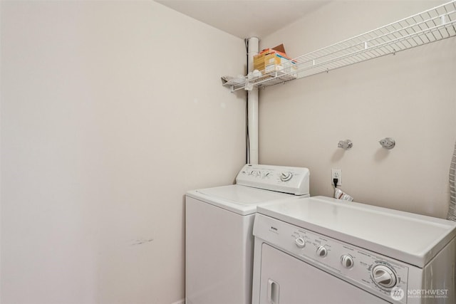 300 N 137th St Unit C, Seattle, WA 98133 - washroom featuring separate washer and dryer