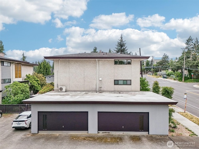 300 N 137th St Unit C, Seattle, WA 98133 - back of property with a garage