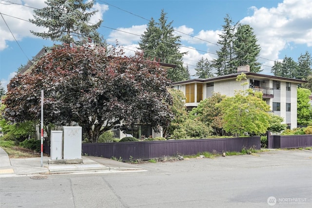 300 N 137th St Unit C, Seattle, WA 98133 - view of home's exterior featuring a chimney