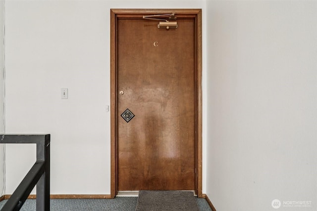 300 N 137th St Unit C, Seattle, WA 98133 - corridor with carpet flooring and baseboards