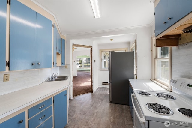 kitchen featuring white range with electric stovetop, a sink, light countertops, blue cabinetry, and freestanding refrigerator
