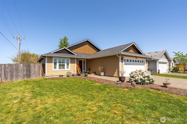 101 Holloway Dr, Chehalis, WA 98532 - craftsman house featuring fence, driveway, a garage, a front yard, and board and batten siding