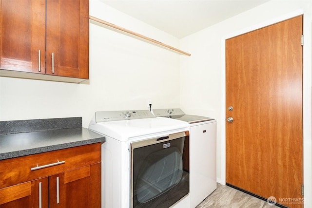101 Holloway Dr, Chehalis, WA 98532 - clothes washing area with cabinet space and washing machine and clothes dryer