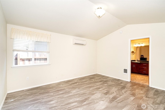 101 Holloway Dr, Chehalis, WA 98532 - unfurnished room with visible vents, lofted ceiling, and a wall unit AC