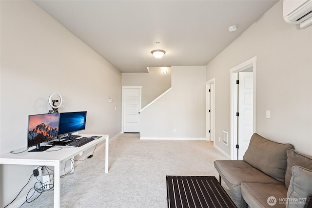office space with light colored carpet, an AC wall unit, baseboards, and visible vents