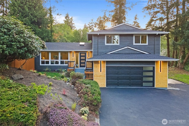 24258 33rd Ct W, Brier, WA 98036 - tri-level home with driveway, a garage, and roof with shingles