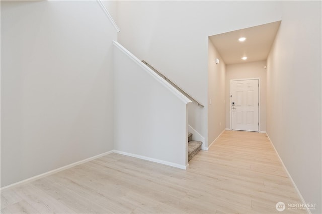 13509 197th St E, Graham, WA 98338 - staircase featuring wood finished floors, recessed lighting, and baseboards
