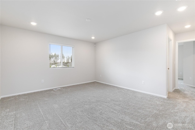 13509 197th St E, Graham, WA 98338 - spare room featuring carpet flooring, recessed lighting, and baseboards