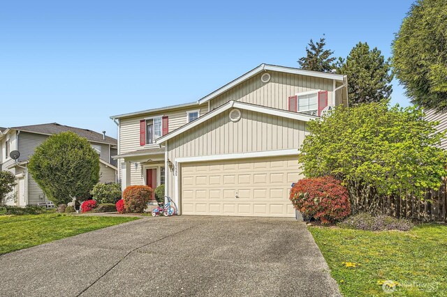 29685 129th Pl SE, Auburn, WA 98092 - traditional home with a front yard, driveway, and a garage