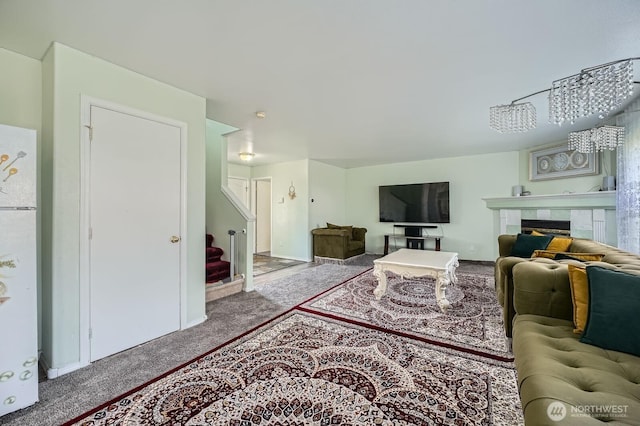 29685 129th Pl SE, Auburn, WA 98092 - carpeted living area featuring a fireplace, baseboards, and stairs