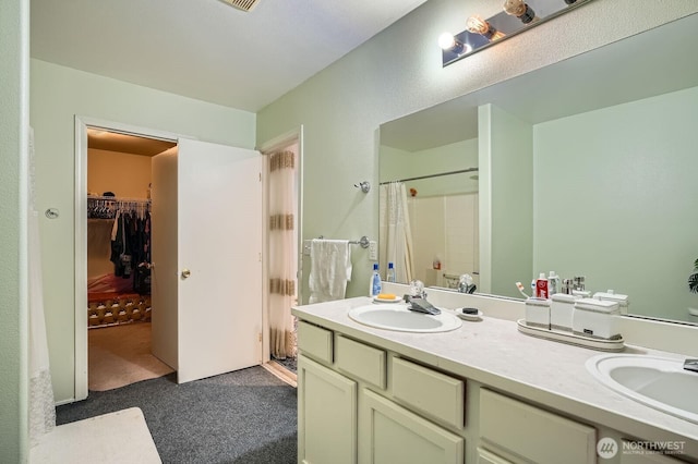29685 129th Pl SE, Auburn, WA 98092 - bathroom with double vanity, a spacious closet, a shower with shower curtain, and a sink