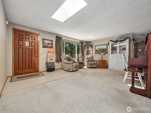 27709 293rd Ave SE, Ravensdale, WA 98051 - carpeted living room with a textured ceiling, a skylight, baseboards, and tile patterned flooring