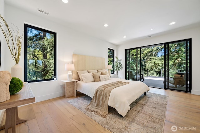 17720 SE 63rd Pl, Bellevue, WA 98006 - bedroom featuring recessed lighting, light wood-style floors, and access to outside