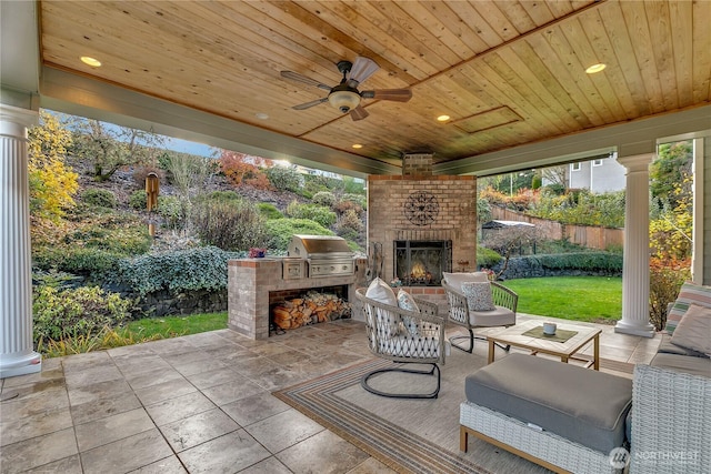 6725 Mirror Ct SE, Olympia, WA 98513 - view of patio with a grill, an outdoor living space with a fireplace, and a ceiling fan