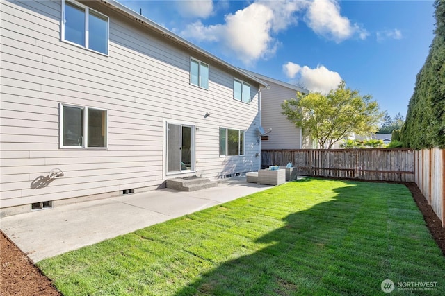 back of property with crawl space, an outdoor living space, a lawn, a fenced backyard, and a patio