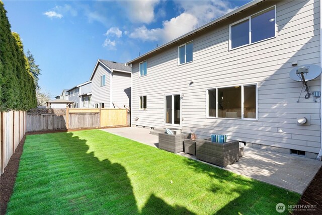 back of house with a fenced backyard, crawl space, a yard, and a patio