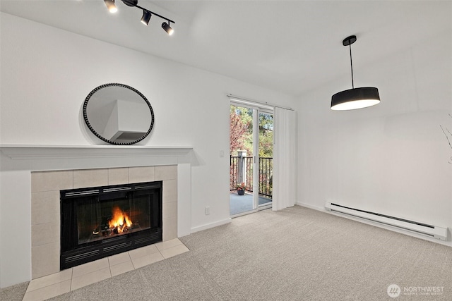 15415 35th Ave W Unit C304, Lynnwood, WA 98087 - unfurnished living room with a baseboard heating unit, carpet floors, baseboards, and a fireplace