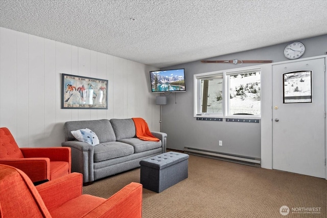 carpeted living area with a baseboard radiator and a textured ceiling