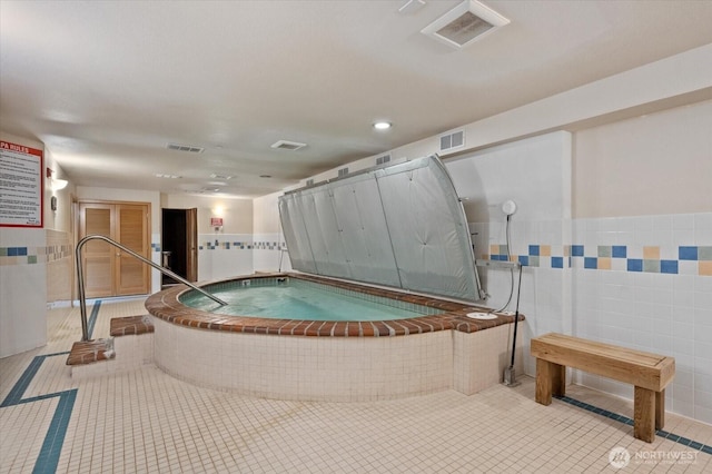 interior space featuring an indoor hot tub