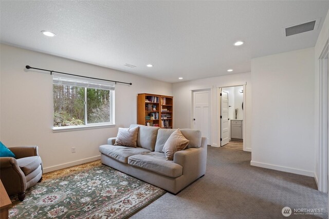 17908 NE 391st St, Amboy, WA 98601 - carpeted living room featuring visible vents, baseboards, and recessed lighting