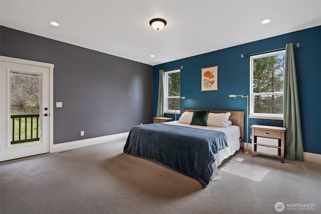 17908 NE 391st St, Amboy, WA 98601 - carpeted bedroom with access to exterior, baseboards, multiple windows, and visible vents