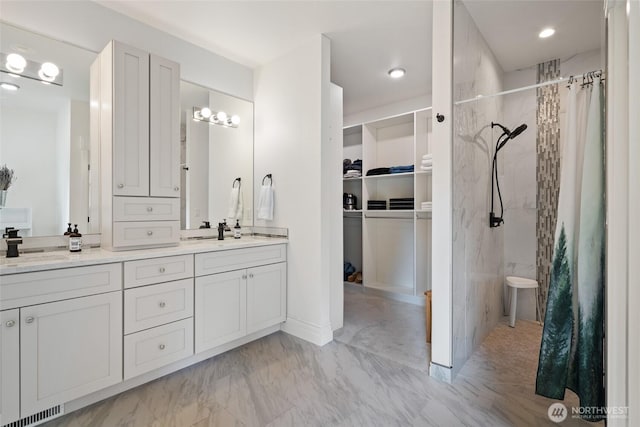 17908 NE 391st St, Amboy, WA 98601 - full bathroom featuring visible vents, a shower with curtain, a sink, a spacious closet, and double vanity