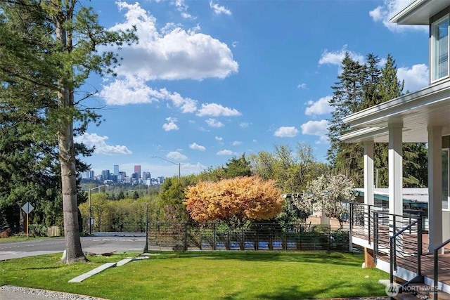 view of yard featuring a view of city