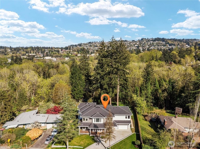 bird's eye view with a forest view