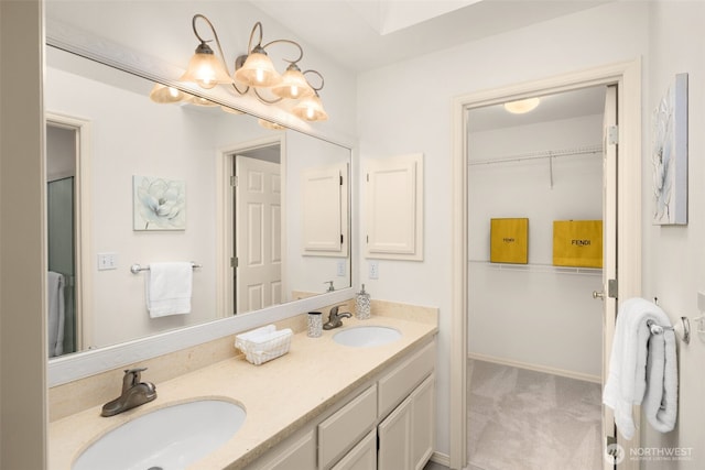 full bathroom with double vanity and a spacious closet