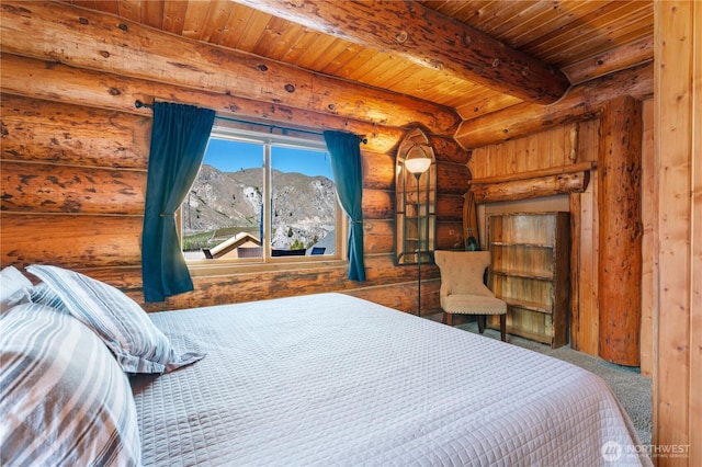carpeted bedroom with rustic walls, a mountain view, beam ceiling, and wooden ceiling