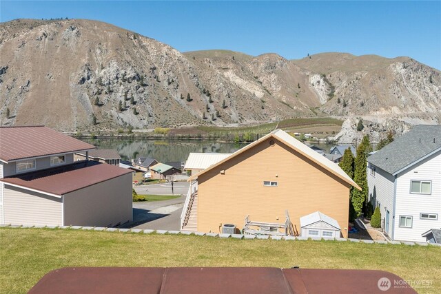 mountain view featuring a water view