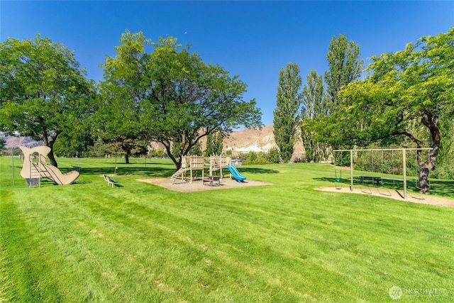 view of yard featuring playground community