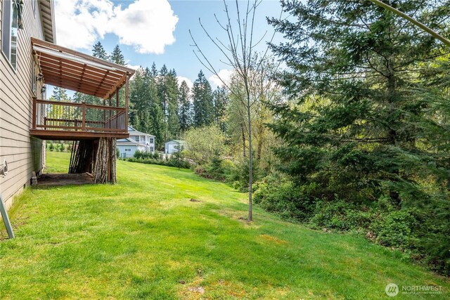view of yard featuring a deck
