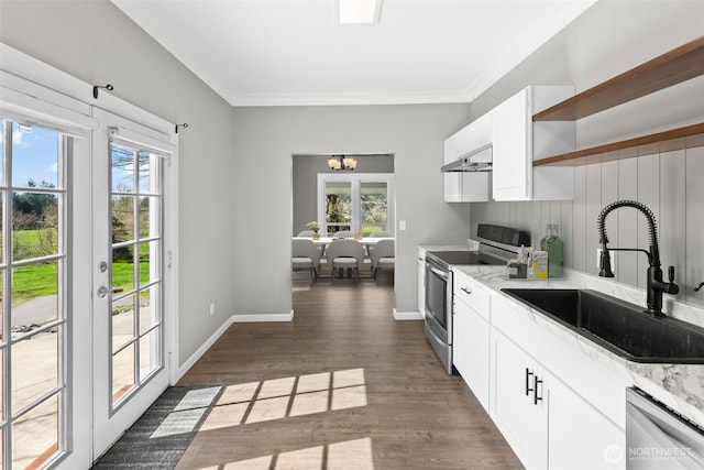 4723 Parker Rd E, Sumner, WA 98390 - kitchen featuring under cabinet range hood, plenty of natural light, appliances with stainless steel finishes, and a sink