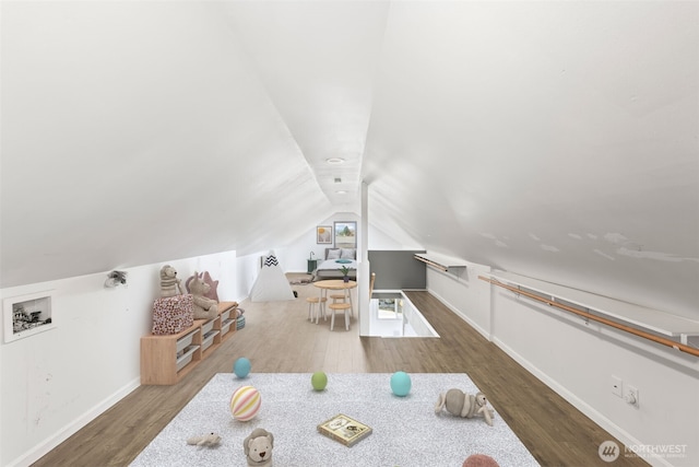 4723 Parker Rd E, Sumner, WA 98390 - additional living space with lofted ceiling, baseboards, and wood finished floors