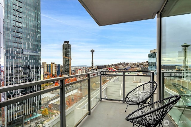 balcony featuring a view of city