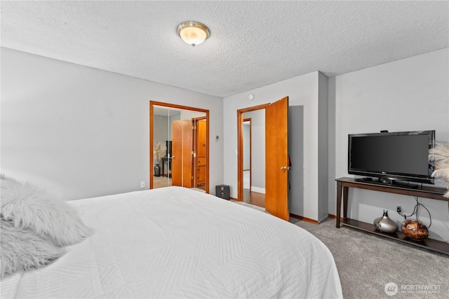 9811 NE 152nd Ave, Vancouver, WA 98682 - bedroom featuring baseboards, carpet flooring, and a textured ceiling