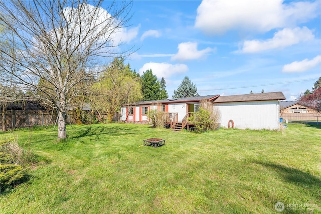 9811 NE 152nd Ave, Vancouver, WA 98682 - view of yard featuring a fire pit and fence