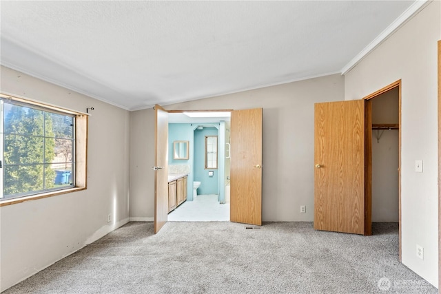 9811 NE 152nd Ave, Vancouver, WA 98682 - unfurnished bedroom featuring light colored carpet, crown molding, and multiple windows