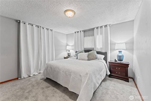 9811 NE 152nd Ave, Vancouver, WA 98682 - bedroom with carpet, a textured ceiling, and baseboards