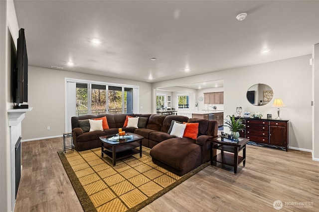 32832 SE Stevens St, Black Diamond, WA 98010 - living room featuring recessed lighting, baseboards, visible vents, and light wood-style flooring