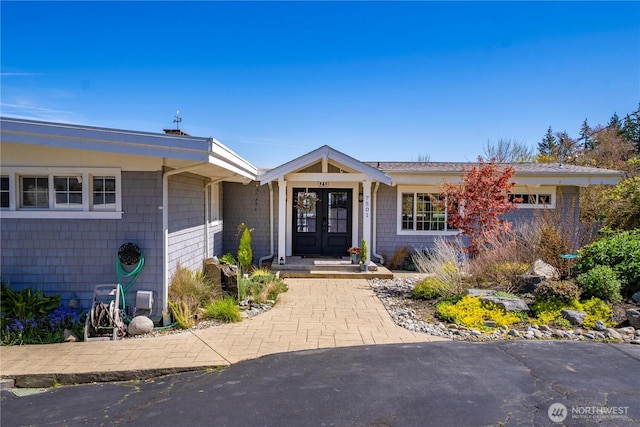7501 Stinson Ave, Gig Harbor, WA 98335 - view of front of home featuring french doors