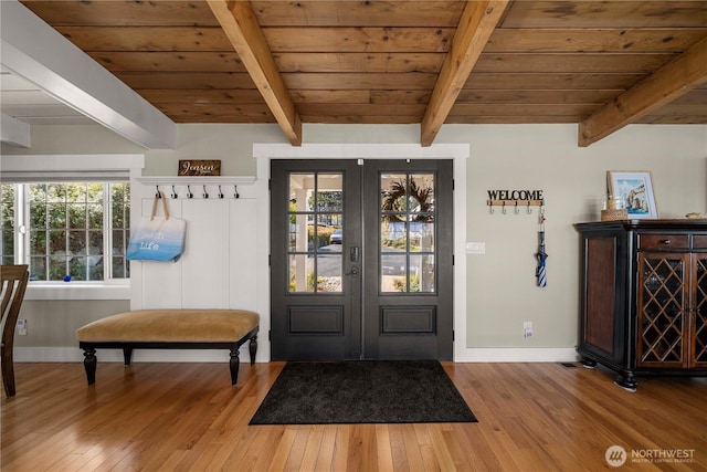7501 Stinson Ave, Gig Harbor, WA 98335 - entryway featuring baseboards, wooden ceiling, wood finished floors, and beam ceiling
